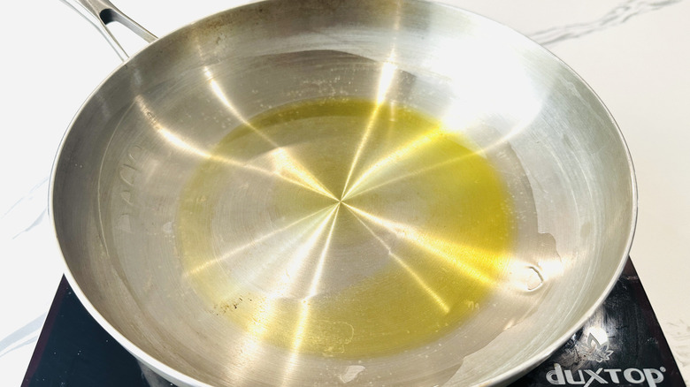 Oil heating in saucepan