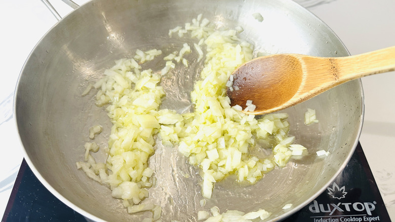 Onion sauteing in saucepan