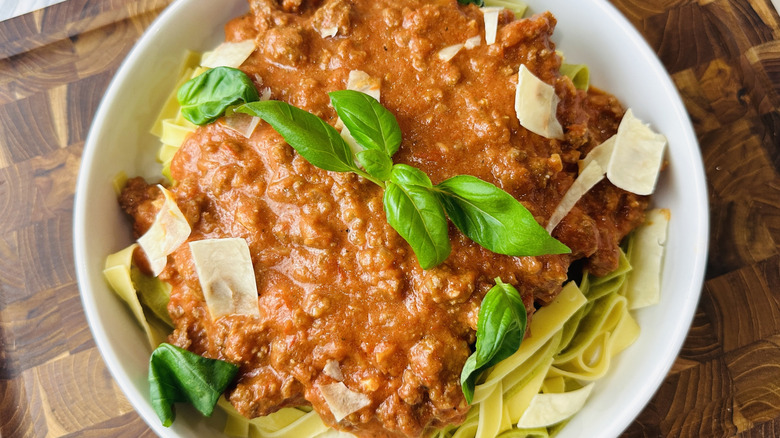 Bolognese served over cooked tagliatelle