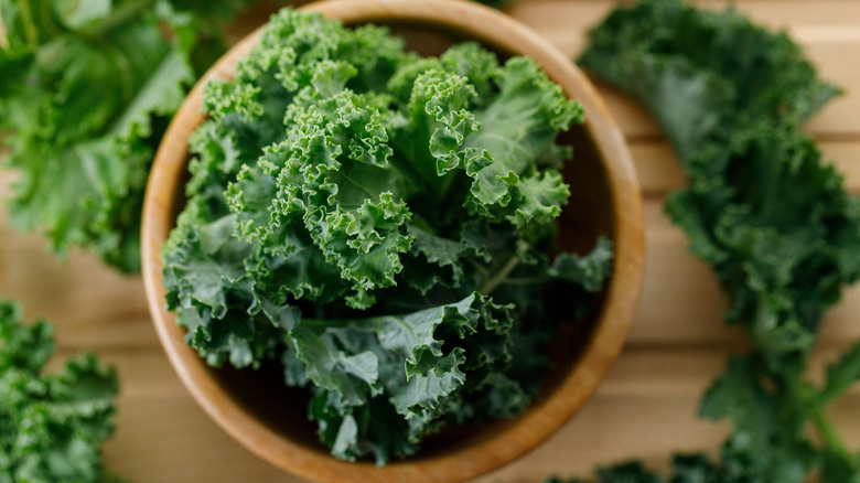 Kale in wooden bowl
