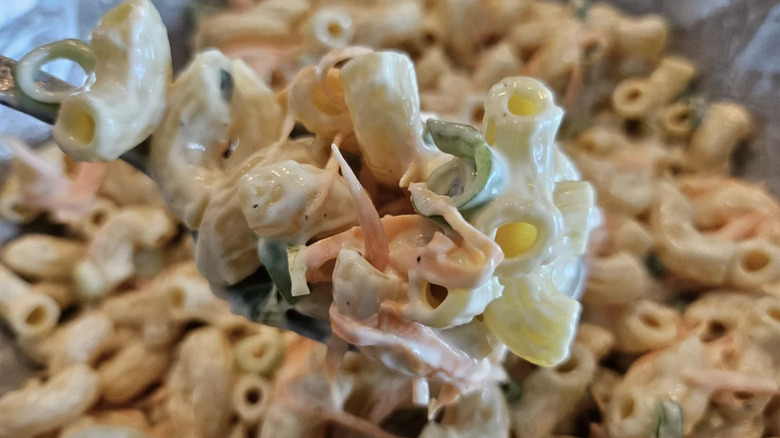 A close up of homemade Hawaiian mac salad on a fork