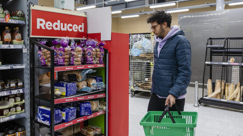 an individual shopping in a supermarket