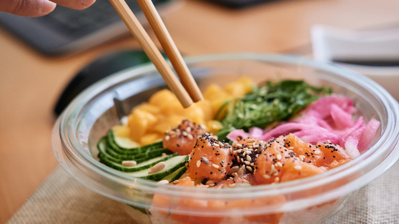 poke bowl with chopsticks