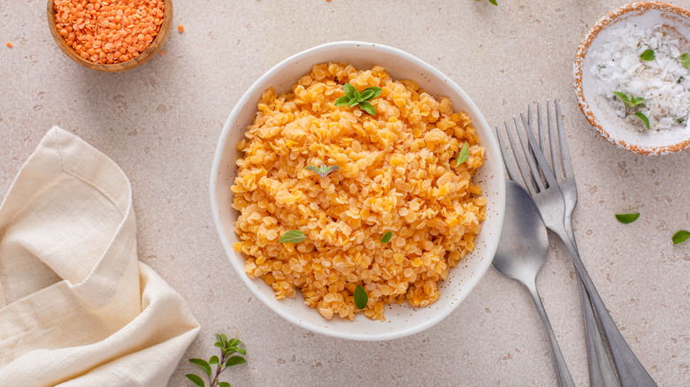 red lentils in white bowl on table