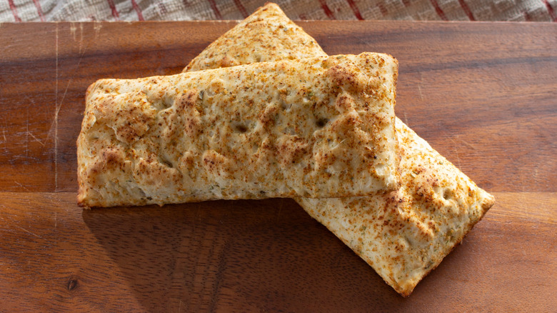 Two Hot Pockets on a wooden table