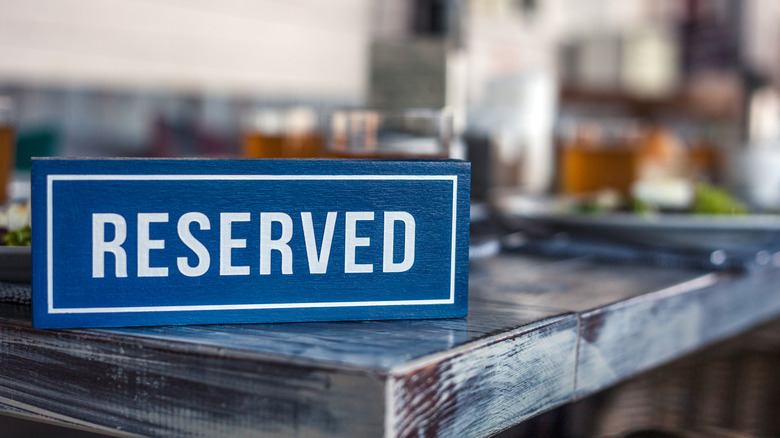 Reserved sign on a restaurant table