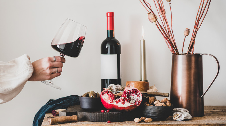 bottle of wine on side table