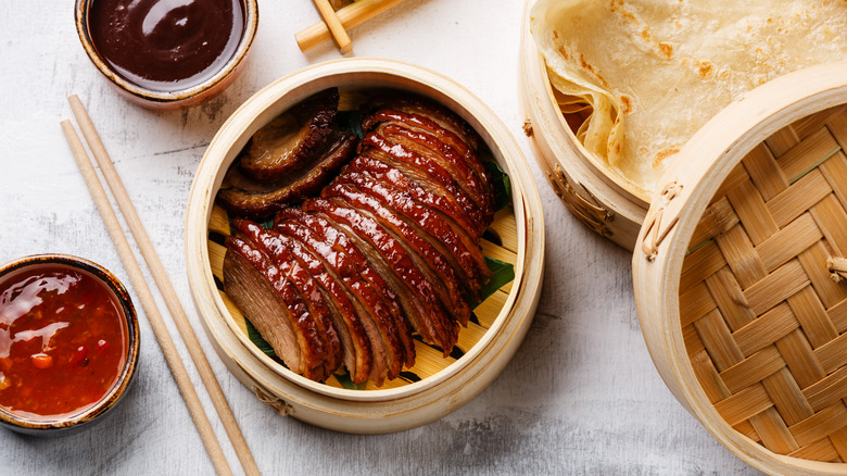 Peking duck in steamer basket