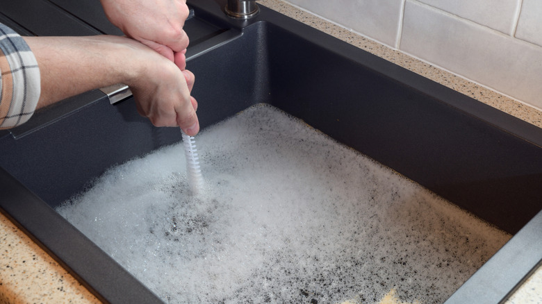 Plunging clogged sink