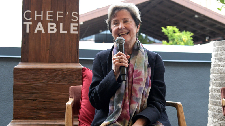 Chef Alice Waters speaking at an event for the Netflix series Chef's Table