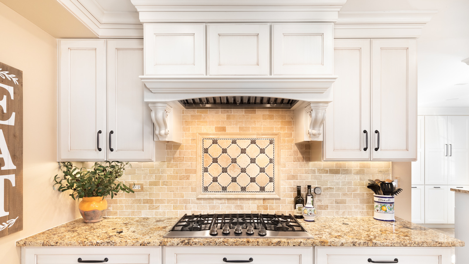 Here's Why Kitchen Cabinets Don't Usually Stretch To The Ceiling