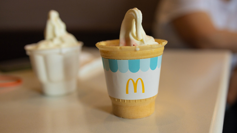 Two ice cream cups from McDonald's