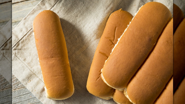 Hot dog buns on a fabric sheet
