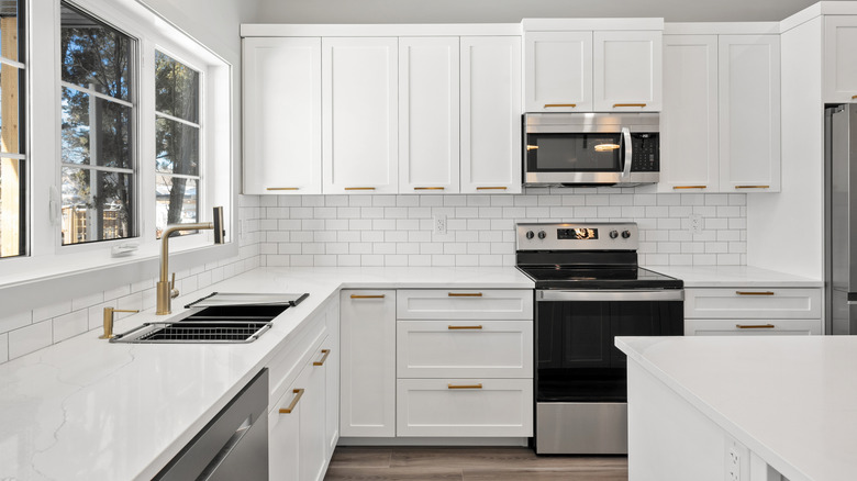 Kitchen with white cabinets