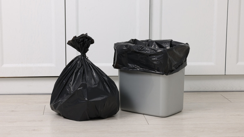 Garbage can in the kitchen.