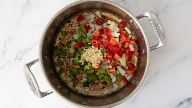 chopped raw vegetables in a metal pot