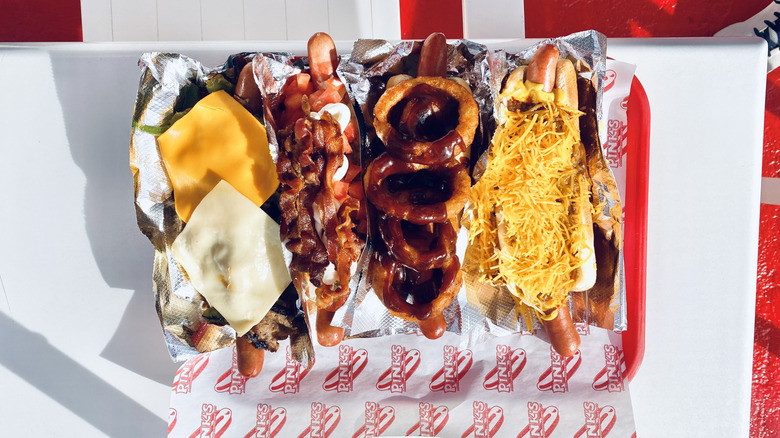 Variety of hot dogs on tray at Pink's in Los Angeles