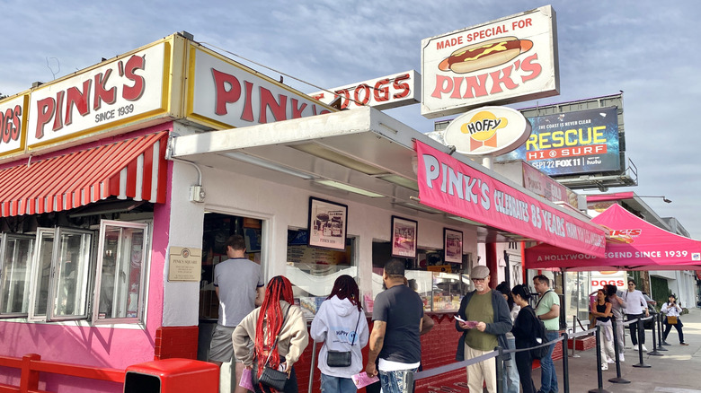 People line up outside Pink's Hot Dogs in Los Angeles