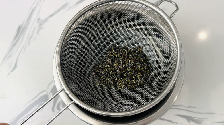 Straining lavender flowers out of syrup