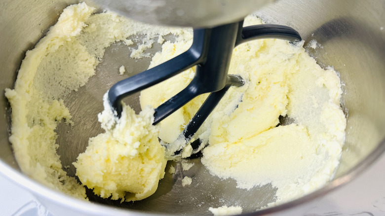 Butter and sugar mixing in bowl