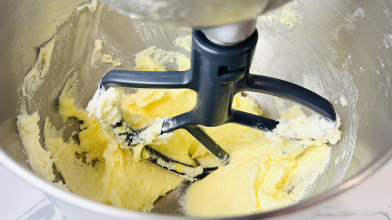 Eggs mixing into butter mixture