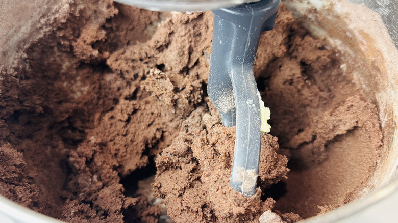 Chocolate cookie dough in mixing bowl