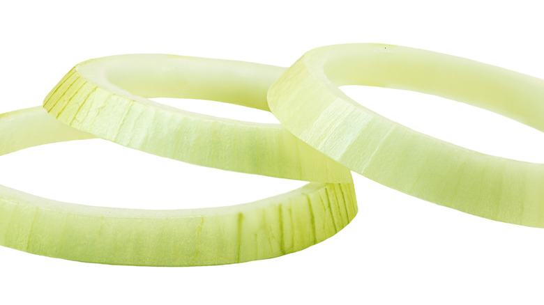 single onion rings isolated on white background