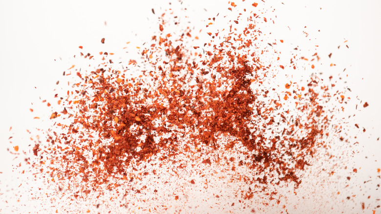 red seasoning on white background