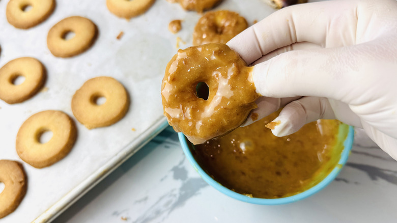 Cookies dipped into coconut caramel