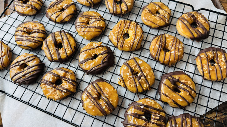 Homemade Samoa cookies on rack