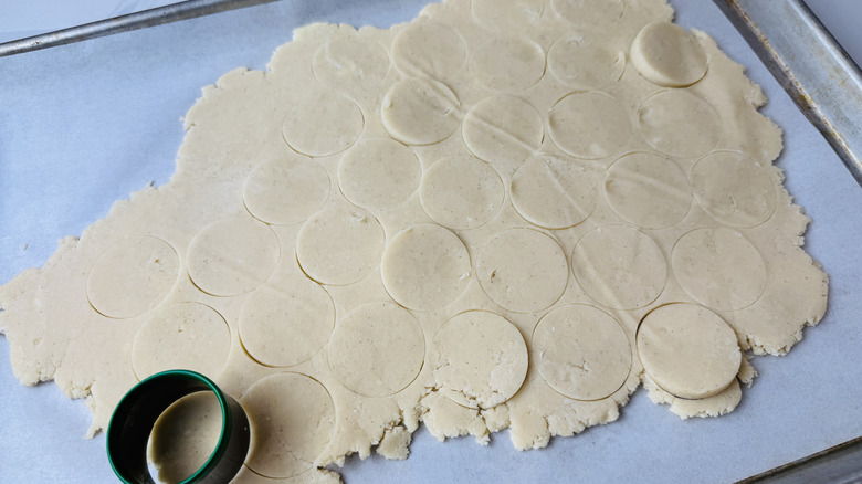 Cookie dough cut into cookie rounds
