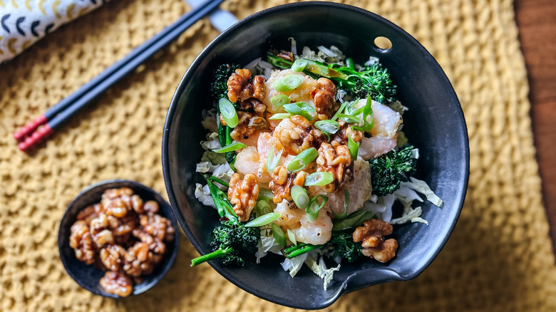 Honey walnut shrimp bowl with chopsticks on table