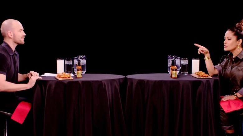 Salma Hayek and Sean Evans talk during Hot Ones episode