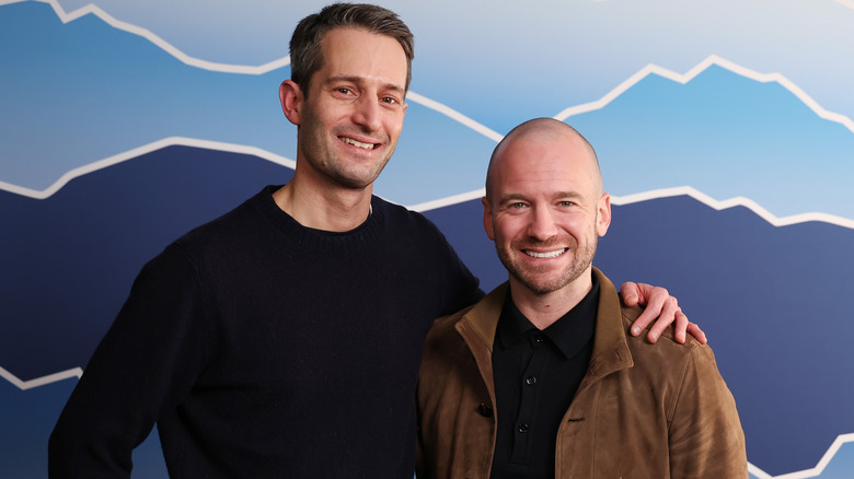 Evans and Schonberger posing together and smiling