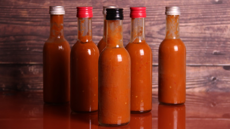 Several hot sauce bottles