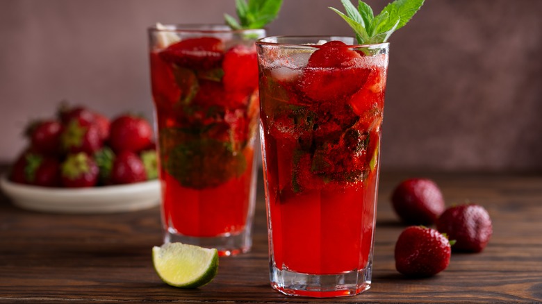 strawberry infused drinks with mint garnish