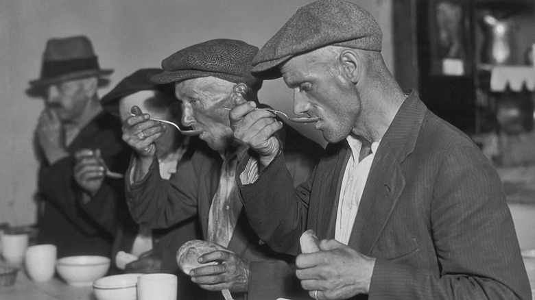 people eating soup during the Great Depression