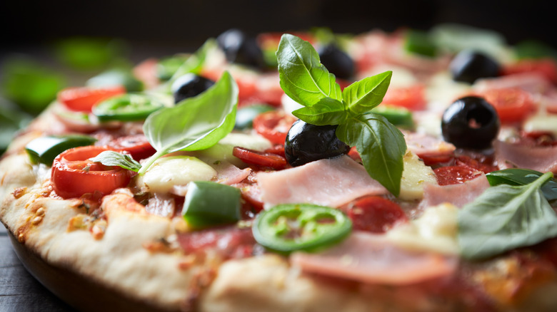 jalapeno toppings on a pizza