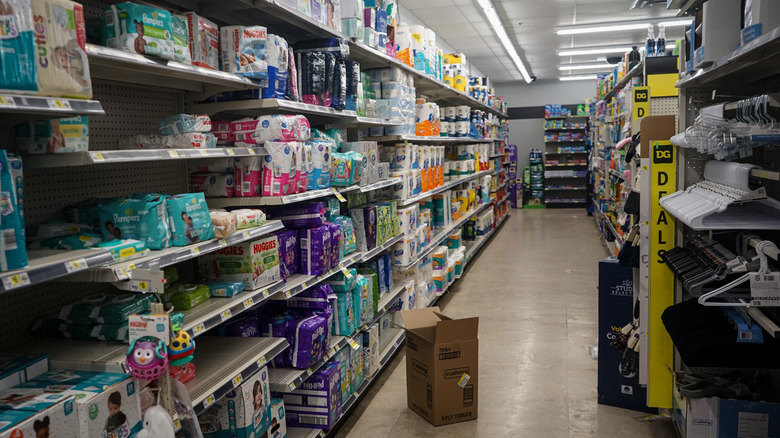 The dimly-lit interior of a Dollar General store.