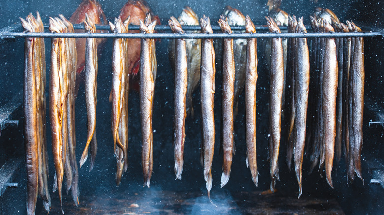 Smoked eels hanging out to dry