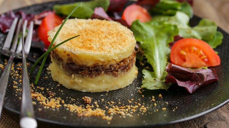 Plate with duck confit parmentier