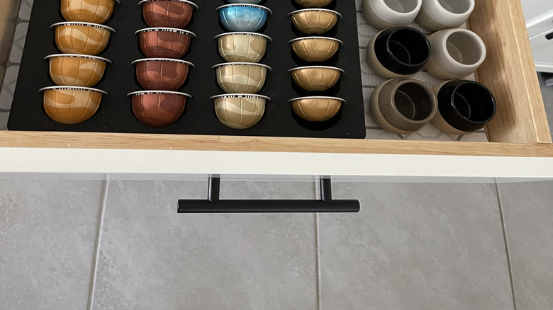Nespresso pods stored in a drawer