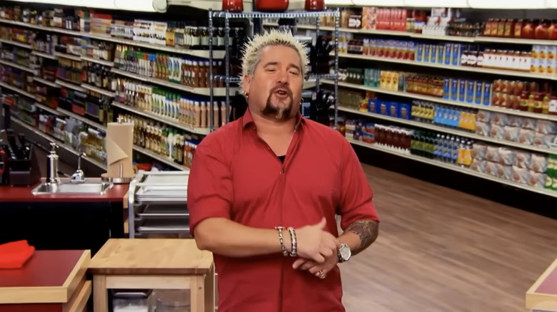 Guy Fieri is on the set of Guy's Grocery Games