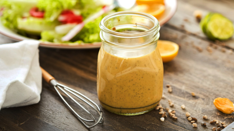 A jar of mustard dressing