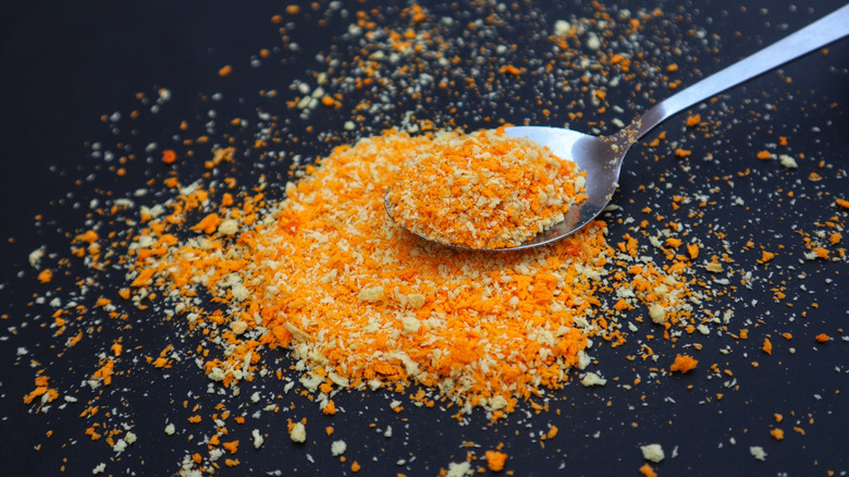 Pile of breadcrumbs with spoon