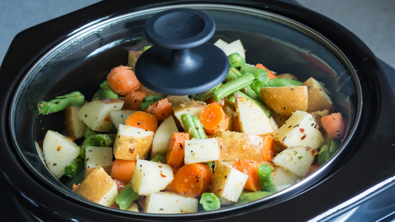 slow cooker full of veggies