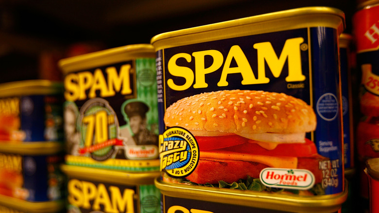 Spam cans stacked on a shelf.