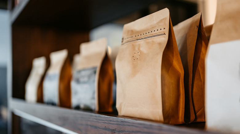 Bags of coffee beans on a shelf