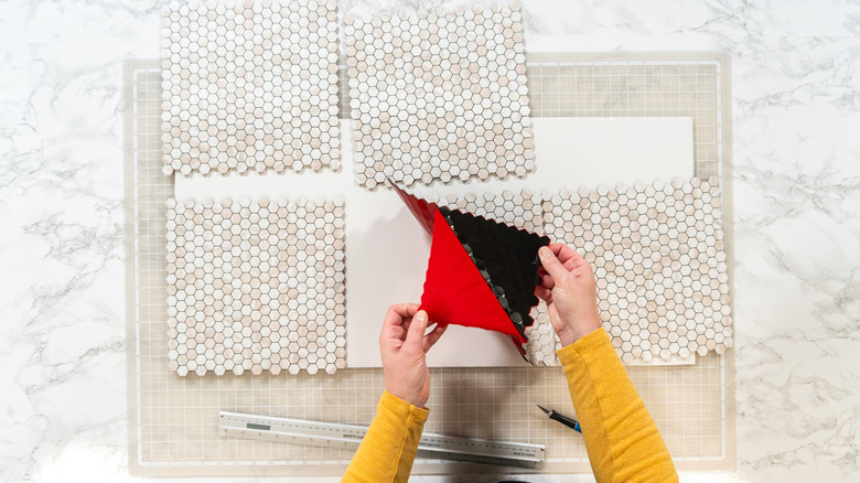 process of installing peel-and-stick tiles