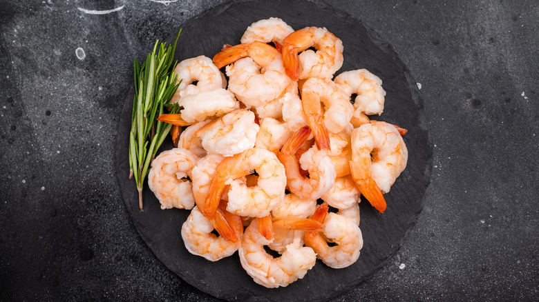 Shrimp on a dark plate